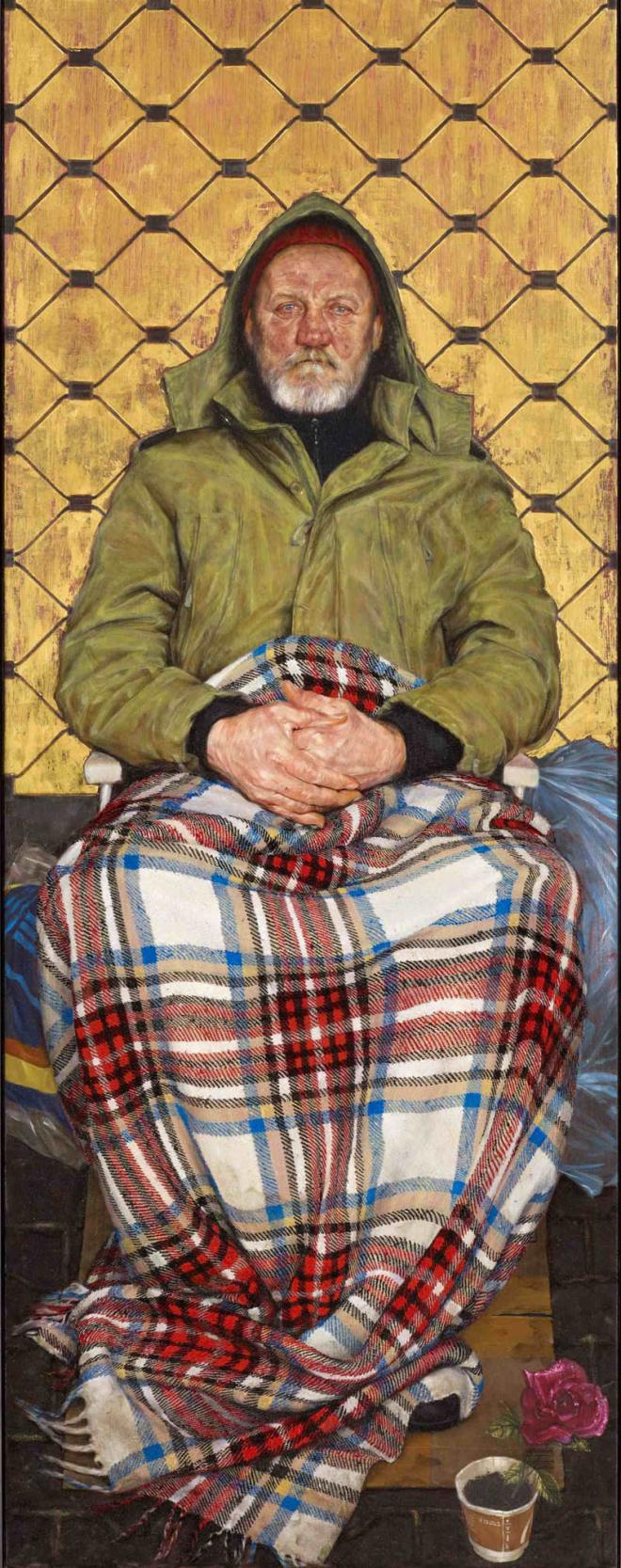 man with plaid blanket painting